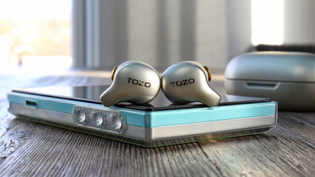 the Tozo Golden X1 and the Fiio JM21